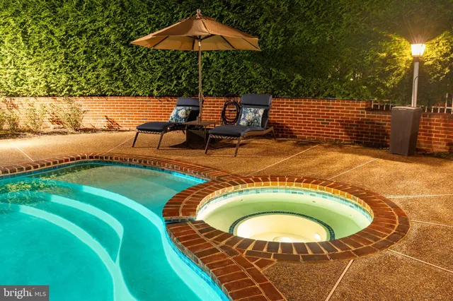 a front view of a house with swimming pool