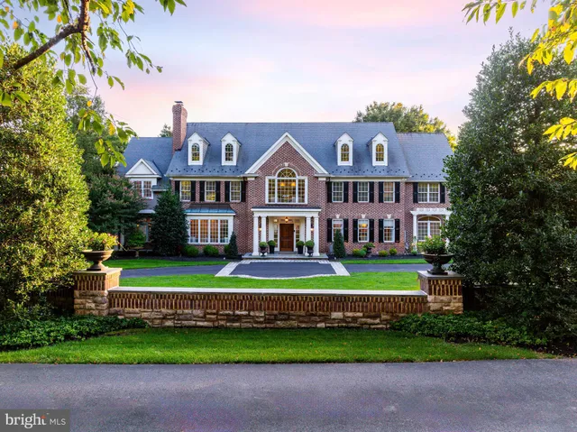 a aerial view of a house with a large window and a yard