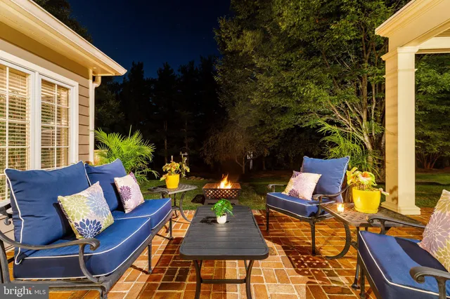 an aerial view of a house with outdoor space and street view