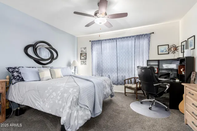 a bedroom with a bed and furniture