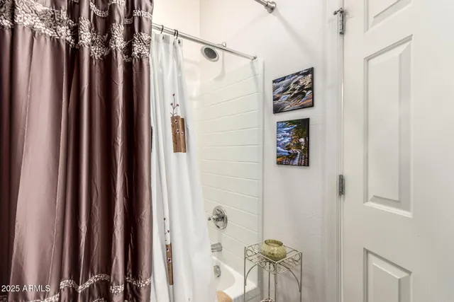 a view of swimming pool with outdoor seating