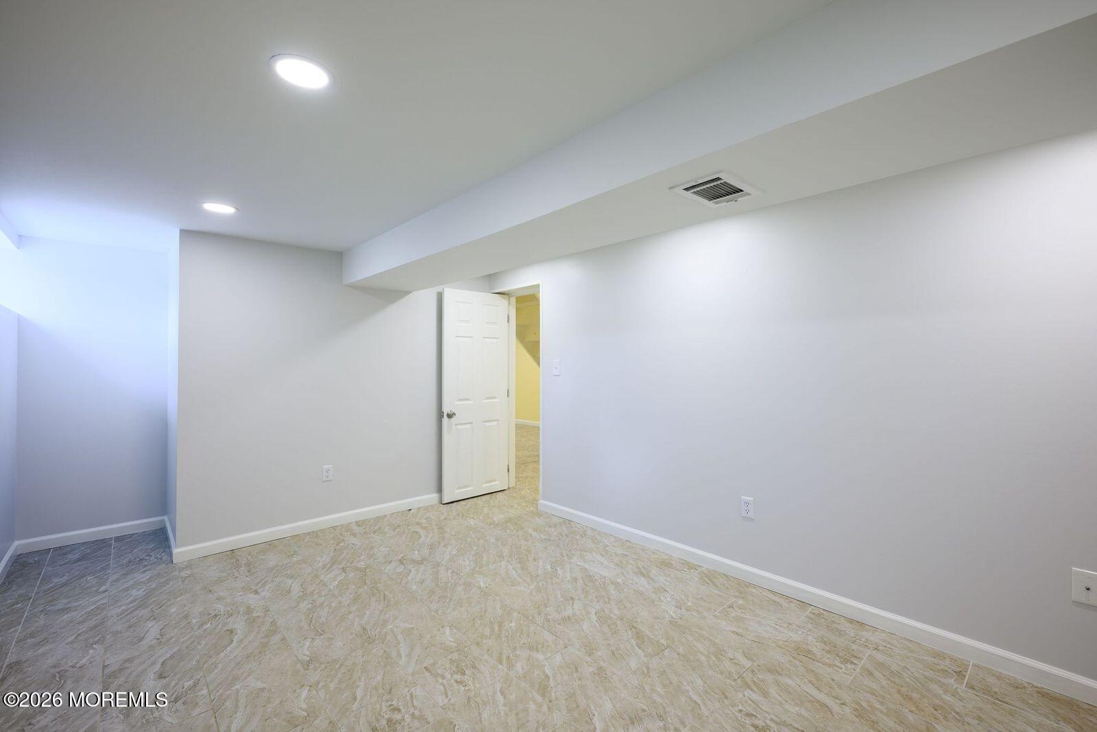 19 Princeton Drive Howell, NJ 07731 - Photo 27 of 36 a view of an empty room