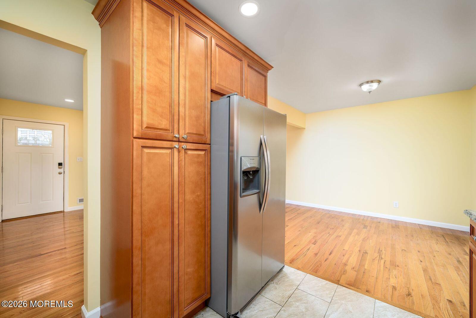 19 Princeton Drive Howell, NJ 07731 - Photo 9 of 36 a view of a hallway with wooden cabinets