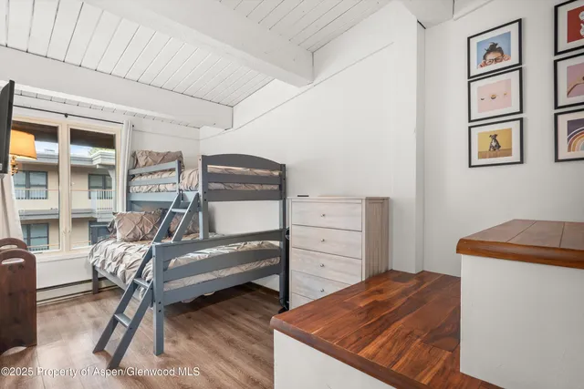 a bedroom with furniture and a bed