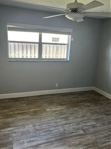 a bathroom with a toilet and a bathtub