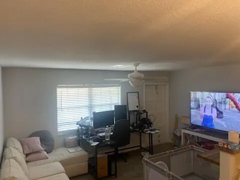 a bathroom with a toilet a sink and a mirror