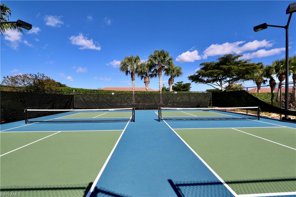 8191 Lucello Terrace North Naples, FL 34114 - Photo 32 of 42 View of tennis court with community basketball court