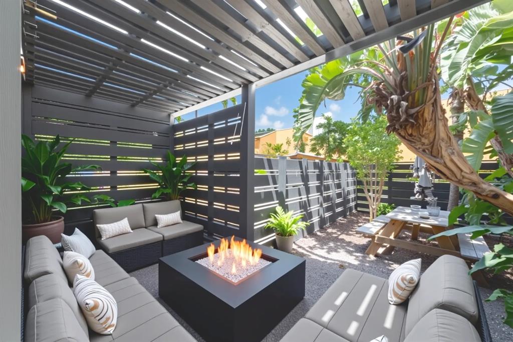 722 Northeast 15th Avenue, Unit 2 Fort Lauderdale, FL 33304 - Photo 21 of 27 a outdoor living space with patio furniture and potted plants