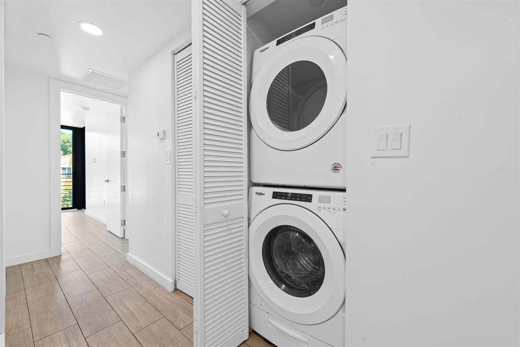 722 Northeast 15th Avenue, Unit 2 Fort Lauderdale, FL 33304 - Photo 23 of 27 a view of a hallway with washer and dryer