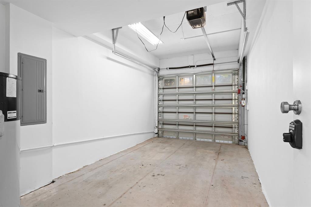 722 Northeast 15th Avenue, Unit 2 Fort Lauderdale, FL 33304 - Photo 26 of 27 a view of a room with racks on the wall