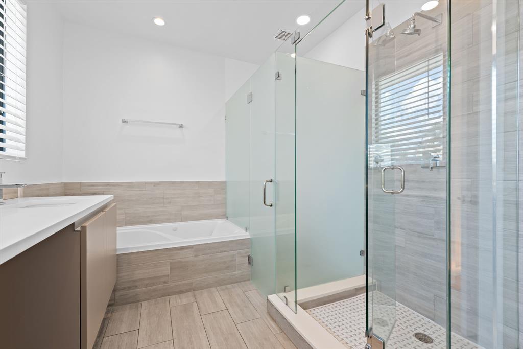 722 Northeast 15th Avenue, Unit 2 Fort Lauderdale, FL 33304 - Photo 10 of 27 a bathroom with a bathtub and a shower