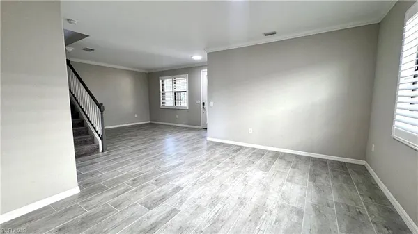 a view of hallway with stairs