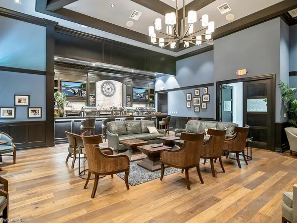 a view of an chairs and bench in the yard