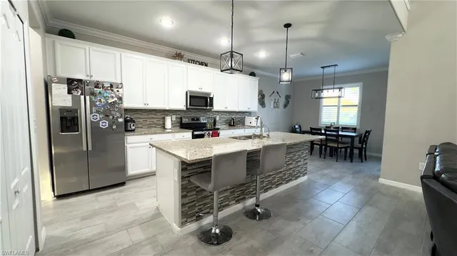 a living room with furniture fireplace and flat screen tv