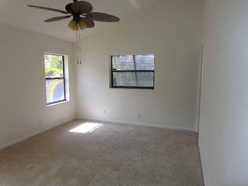 22565 Blue Fin Trail Boca Raton, FL 33428 - Photo 6 of 14 a view of an empty room with a window