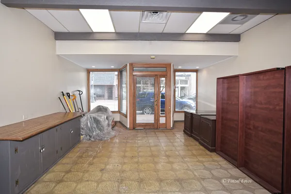 a room with furniture and a large window