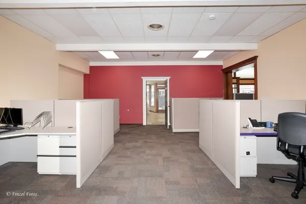 a view of livingroom with furniture and tv