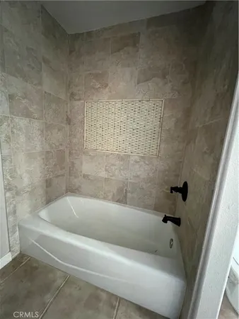 a bathroom with a bathtub