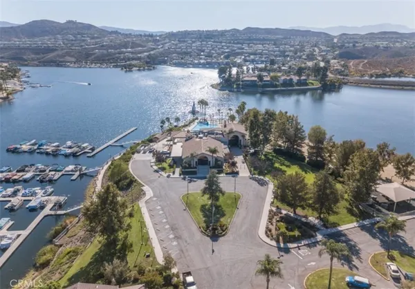 an aerial view of a house with a lake view
