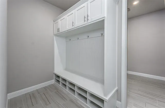 an aerial view of a house with a ocean view