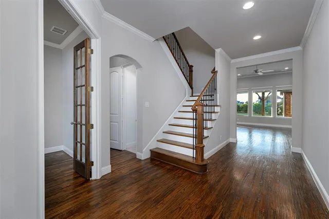 a view of entryway with wooden floor
