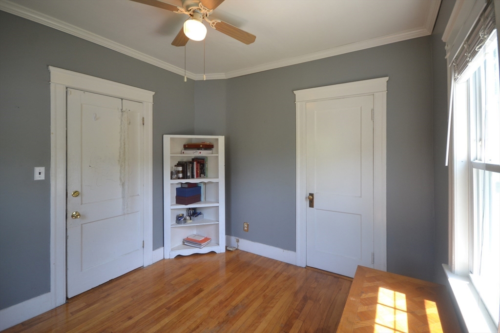 118 King Philip Road Worcester, MA 01606 - Photo 15 of 28 wooden floor in an empty room with a window