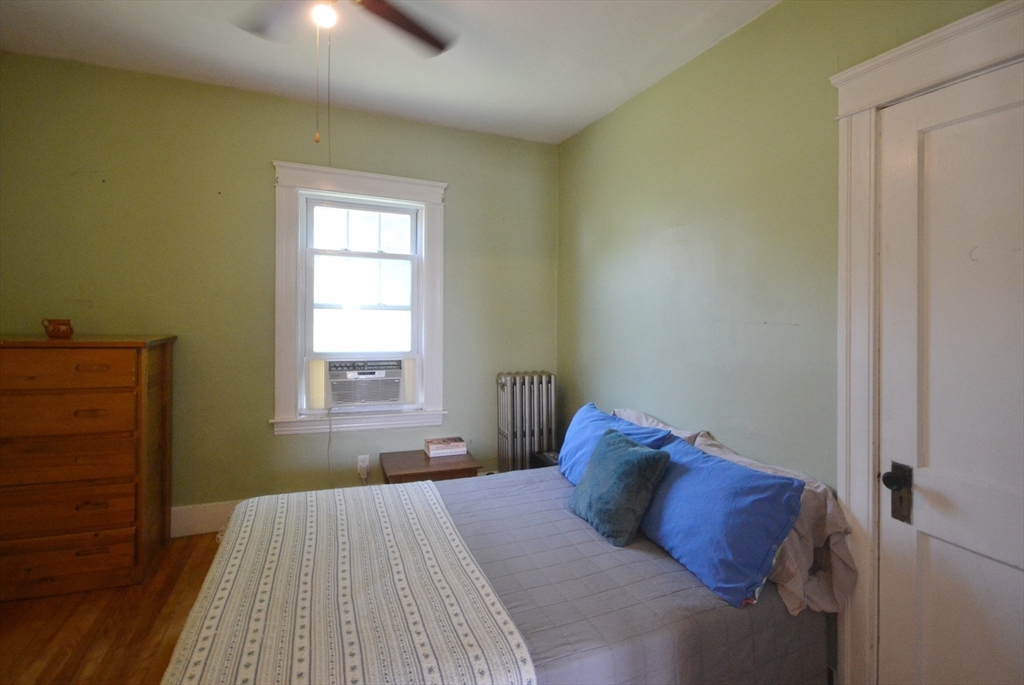 118 King Philip Road Worcester, MA 01606 - Photo 18 of 28 a bedroom with a bed and window