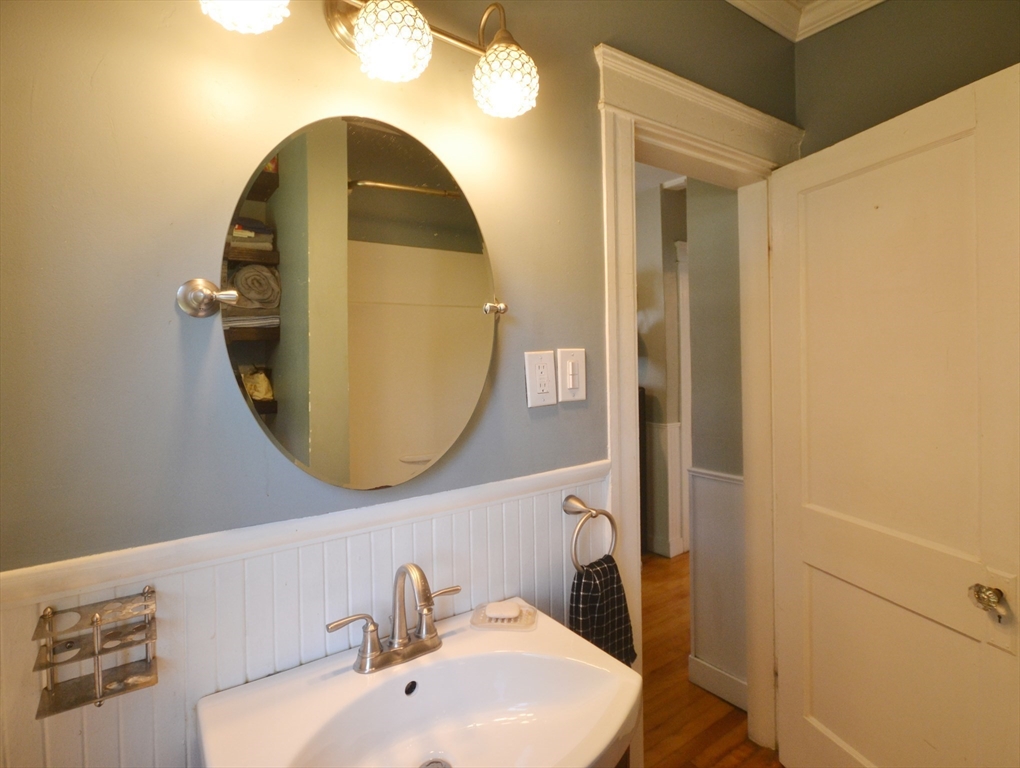 118 King Philip Road Worcester, MA 01606 - Photo 20 of 28 a bathroom with a sink and a mirror
