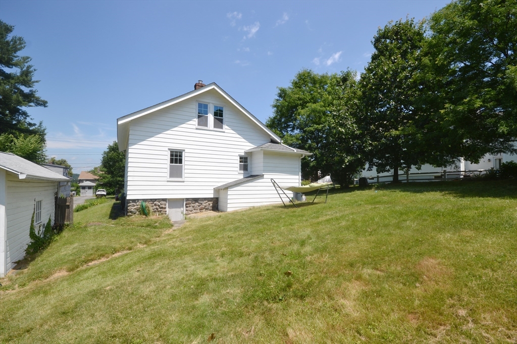 118 King Philip Road Worcester, MA 01606 - Photo 28 of 28 a front view of a house with a yard