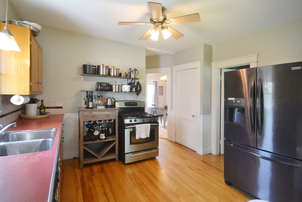 118 King Philip Road Worcester, MA 01606 - Photo 7 of 28 a kitchen with stainless steel appliances a stove a refrigerator and a refrigerator