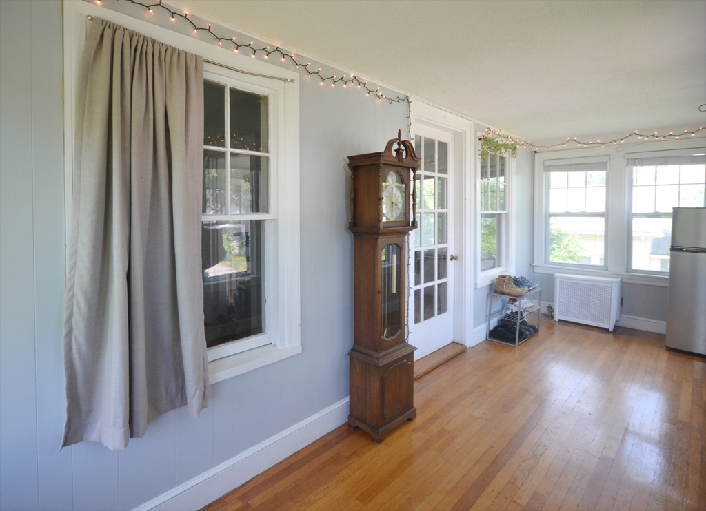 118 King Philip Road Worcester, MA 01606 - Photo 8 of 28 a living room with furniture and a window