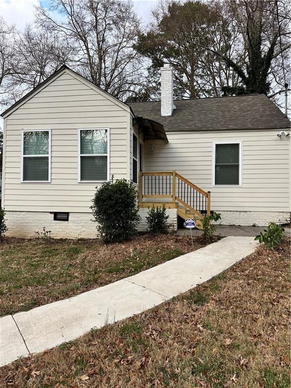 1577 Campbellton Road Southwest Atlanta, GA 30311 - Photo 1 of 23 a front view of a house
