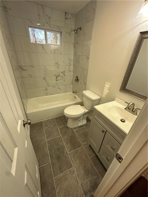 1577 Campbellton Road Southwest Atlanta, GA 30311 - Photo 11 of 23 a bathroom with a sink toilet and shower
