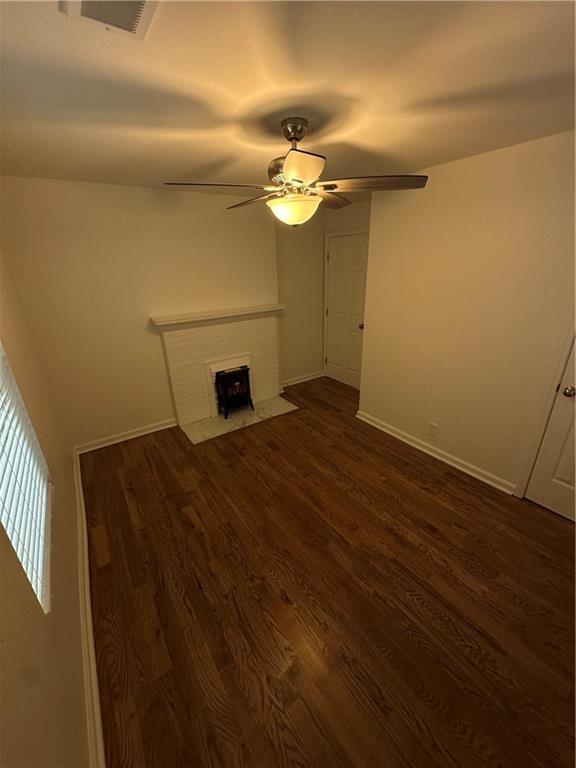 1577 Campbellton Road Southwest Atlanta, GA 30311 - Photo 14 of 23 a bedroom with a bed and a chandelier