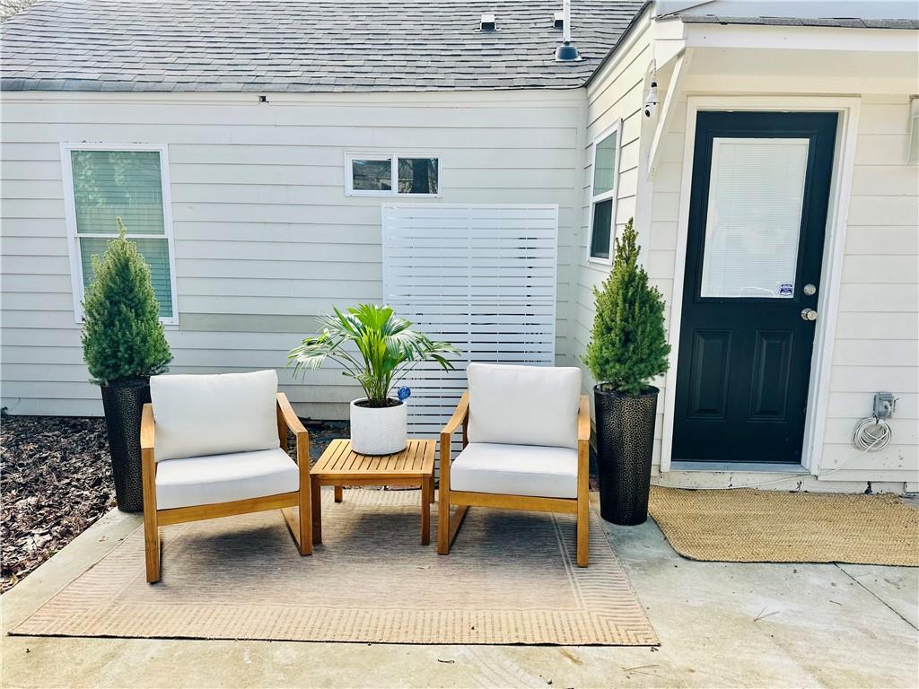 1577 Campbellton Road Southwest Atlanta, GA 30311 - Photo 21 of 23 a view of a house with a patio