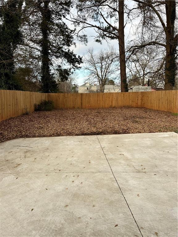 1577 Campbellton Road Southwest Atlanta, GA 30311 - Photo 3 of 23 a view of backyard space