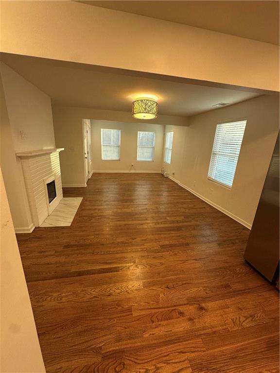 1577 Campbellton Road Southwest Atlanta, GA 30311 - Photo 6 of 23 a view of empty room with wooden floor