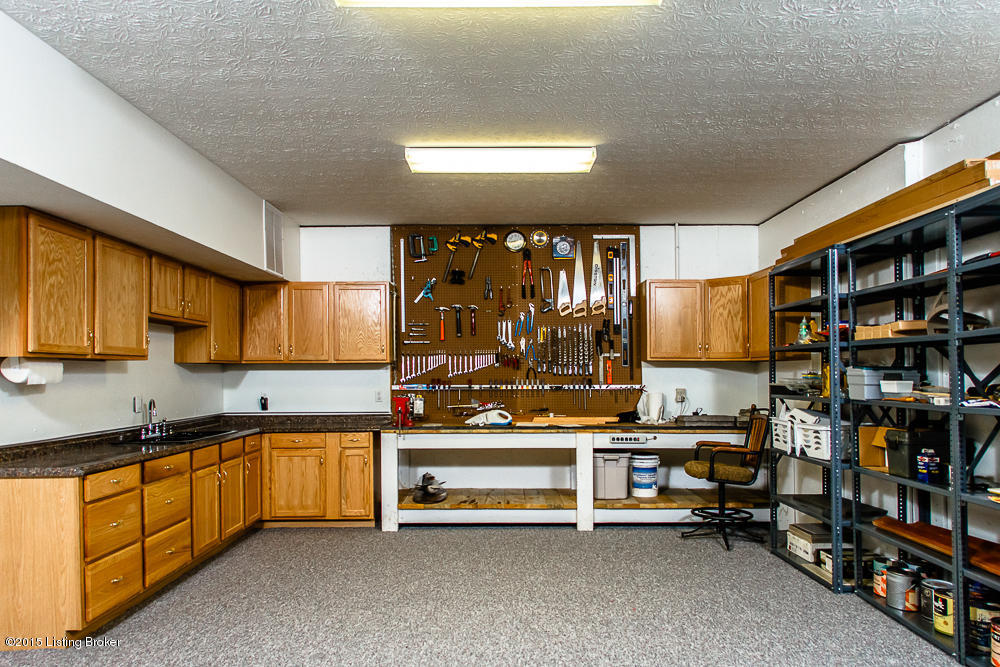1149 Out Post Road Leitchfield, KY 42754 - Photo 46 of 55 Unbelievable lower level work space - dream area for hobby work / crafters etc.