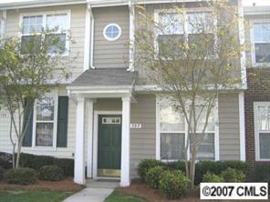 727 Shellstone Place, Unit 727 Fort Mill, SC 29708 - Photo 1 of 5 a front view of a building with a glass door