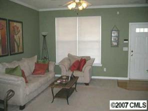 727 Shellstone Place, Unit 727 Fort Mill, SC 29708 - Photo 3 of 5 a living room with furniture and a window