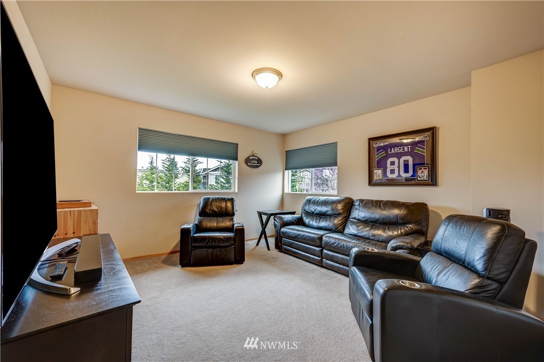 5719 Northeast 3rd Street Renton, WA 98059 - Photo 25 of 40 a living room with furniture and a window