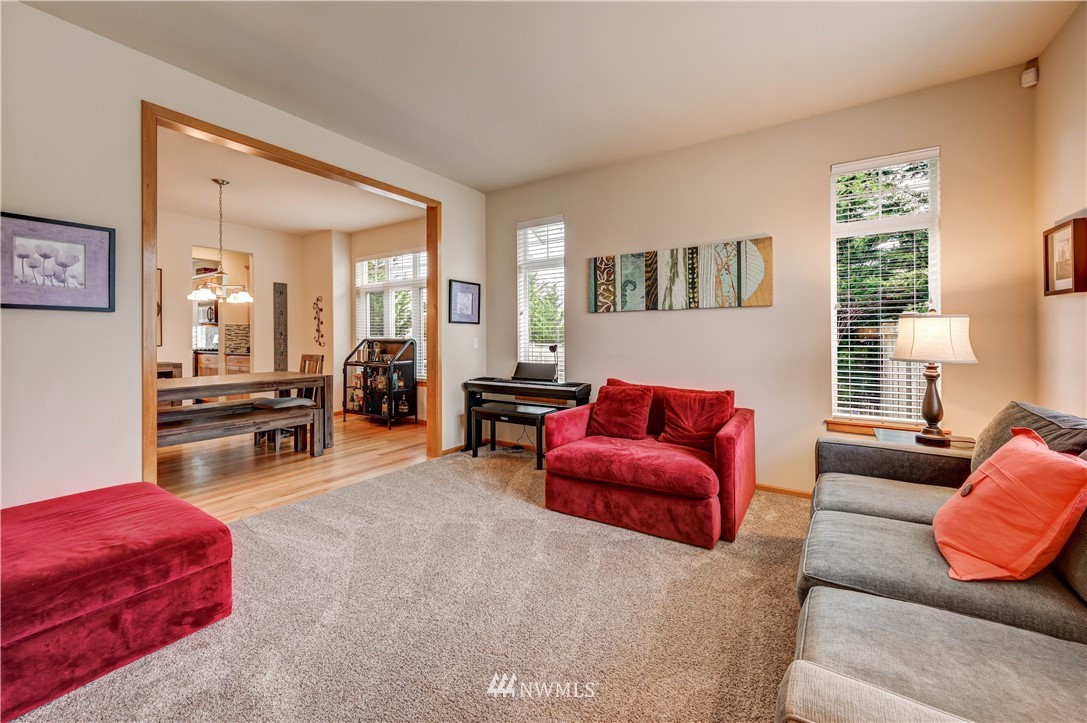 5719 Northeast 3rd Street Renton, WA 98059 - Photo 5 of 40 a living room with furniture and a couch
