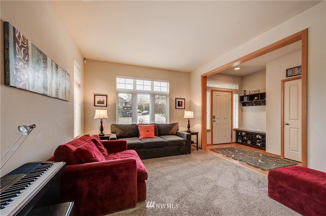 5719 Northeast 3rd Street Renton, WA 98059 - Photo 7 of 40 a living room with furniture and a large window