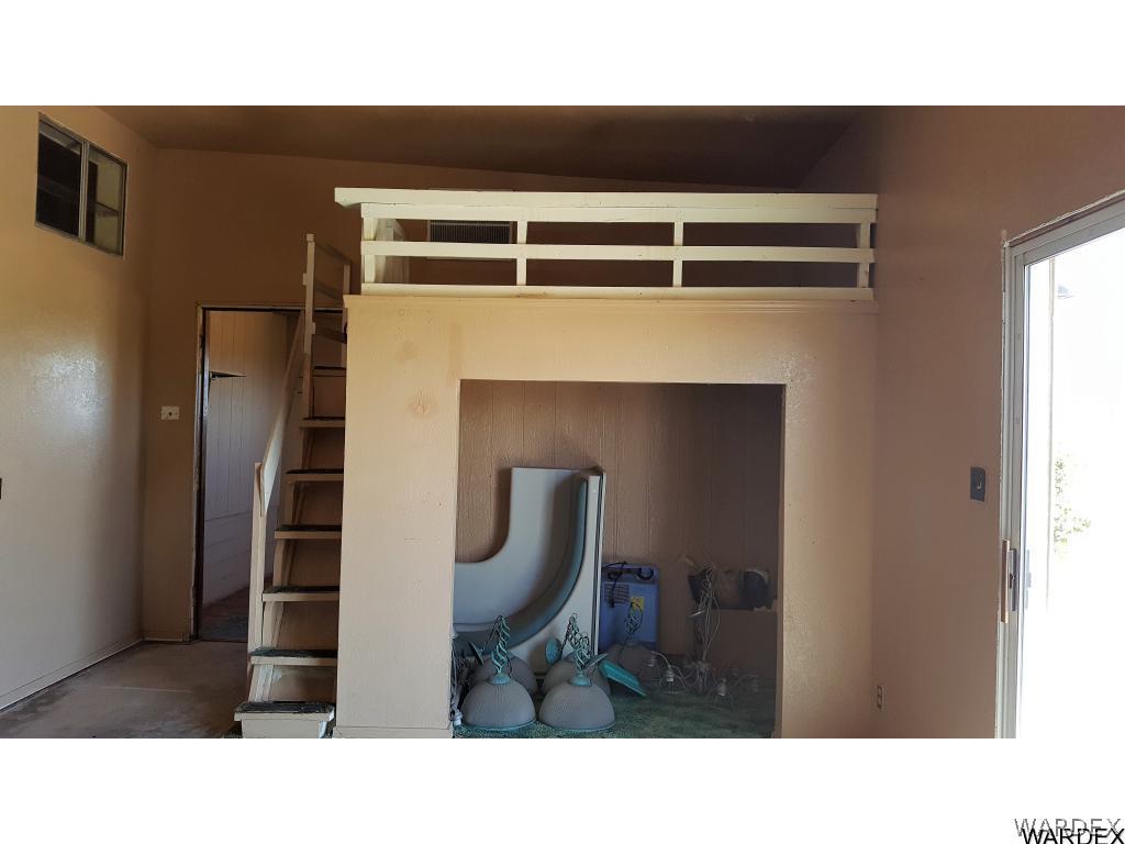 1385 Egar Road Golden Valley, AZ 86413 - Photo 23 of 31 Storage area loft