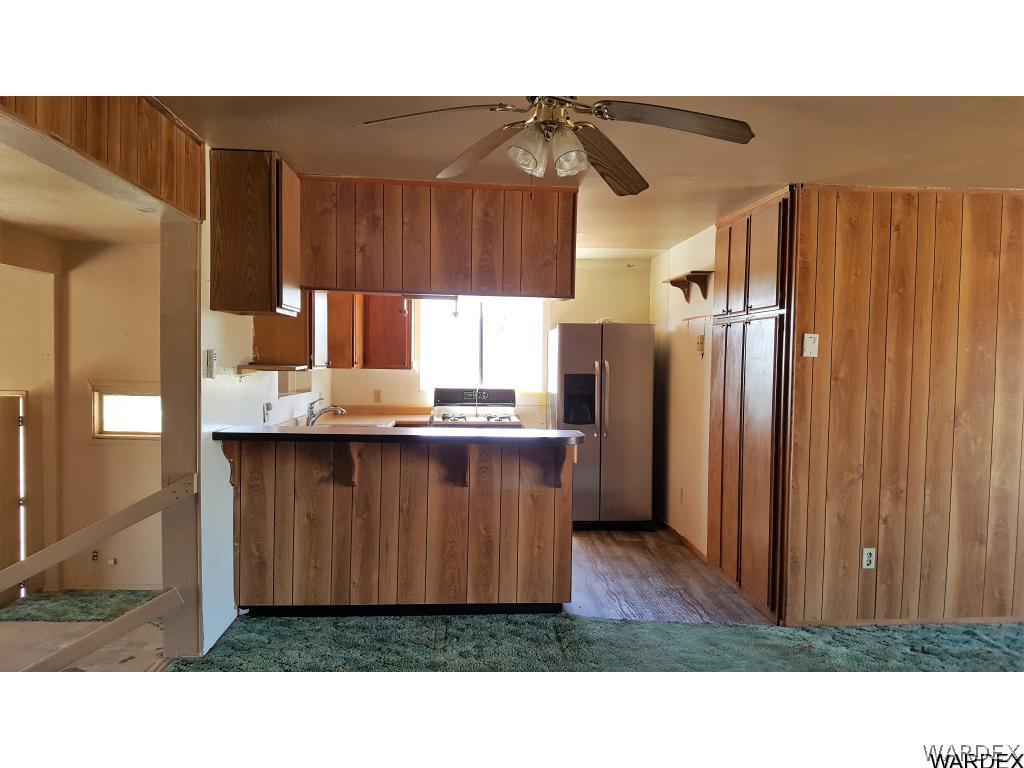 1385 Egar Road Golden Valley, AZ 86413 - Photo 5 of 31 Looking towards kitchen