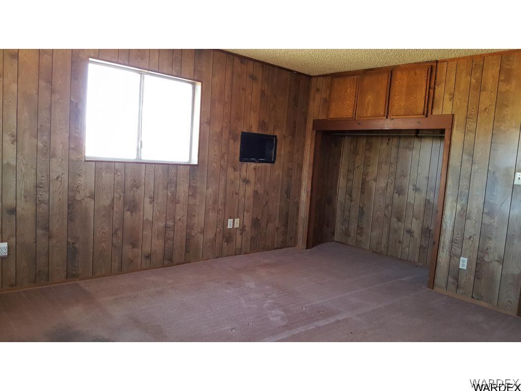 1385 Egar Road Golden Valley, AZ 86413 - Photo 10 of 31 Master bedroom