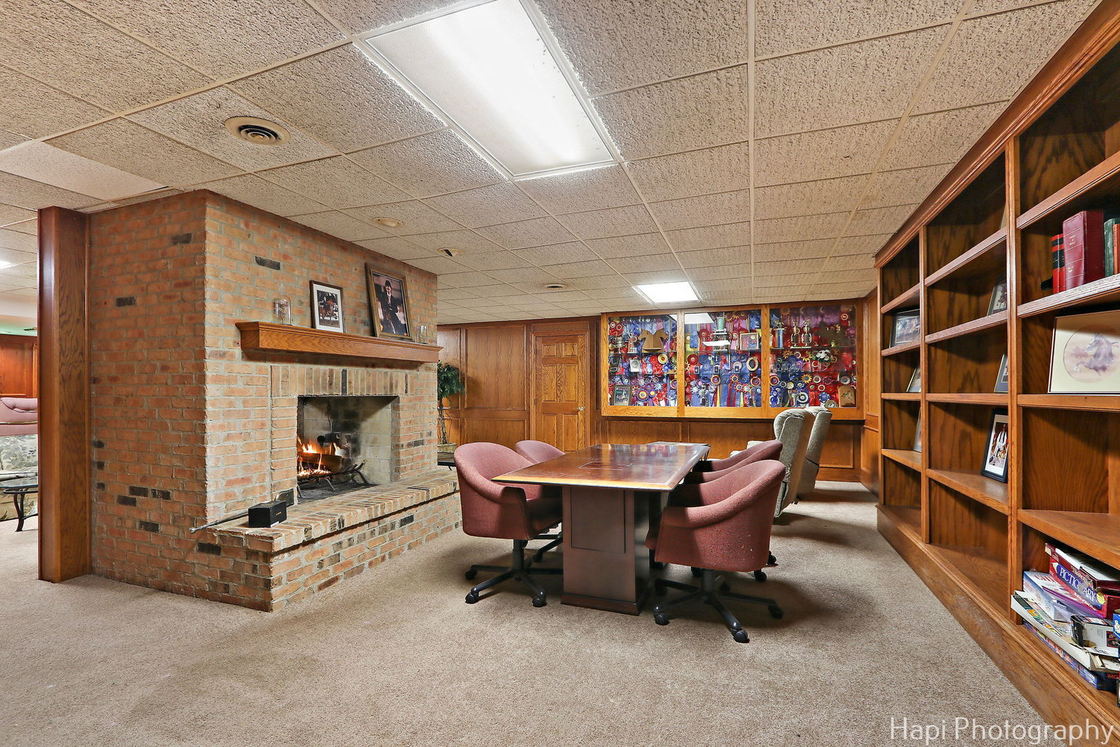 23 West County Line Road Barrington Hills, IL 60010 - Photo 41 of 71 a living room with furniture a rug and a fireplace