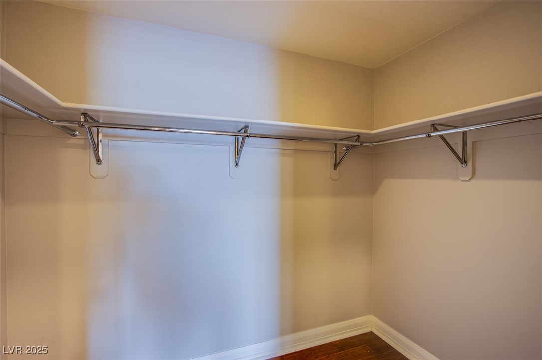 150 South Las Vegas Boulevard, Unit 1212 Las Vegas, NV 89101 - Photo 21 of 45 Spacious closet featuring dark wood-style floors