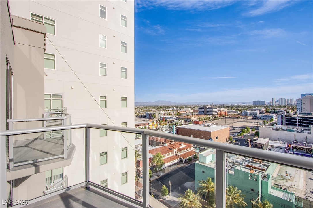 150 South Las Vegas Boulevard, Unit 1212 Las Vegas, NV 89101 - Photo 4 of 45 Balcony featuring a view of city and a mountain view