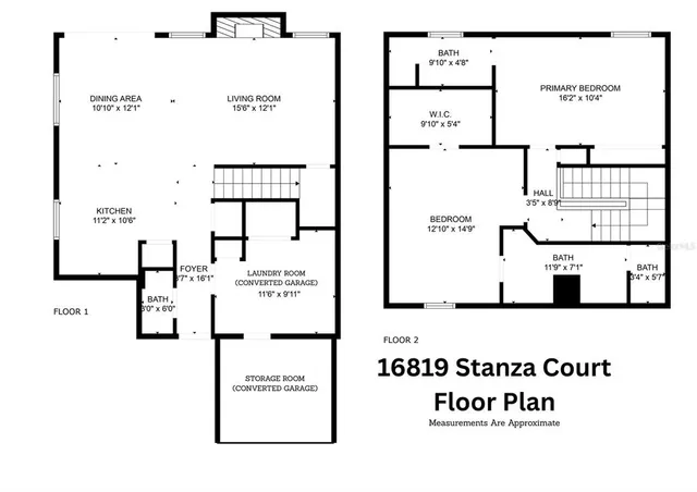 a hall way with furniture a rug and a window